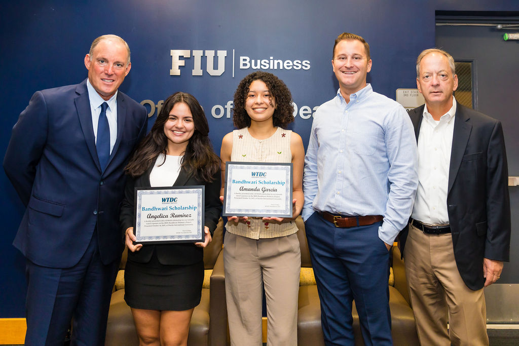 WTDC Bandhwari Scholarship presented at FIU College of Business on October 16, 2025. Awarded to Ms. Amanda Garcia and Ms. Angelica Ramirez. Pictured left to right are Dr. David Wernick, FIU Professor, Angelica Ramirez, Amanda Garcia, Sean Gazitua, WTDC President & CEO, and Dr. William Hardin, Dean of FIU College of Business.